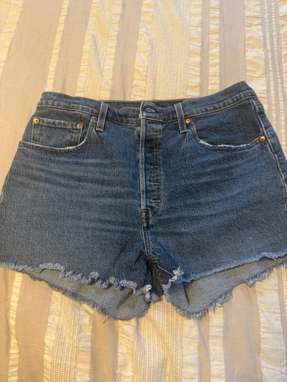 Levi's Dark Blue Cutoff Denim Shorts with Frayed Hem